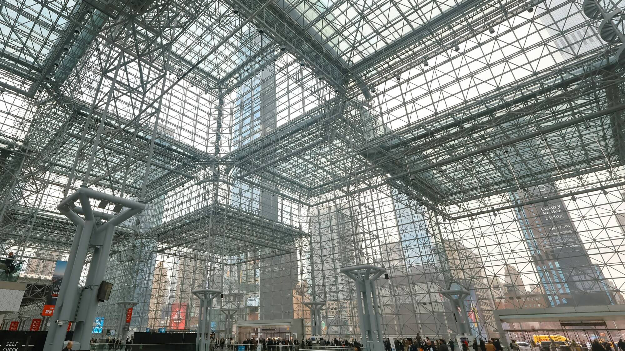 The steel-and-glass Crystal Palace lobby of the Javits Center, the NYC drop-off hall for private car service.